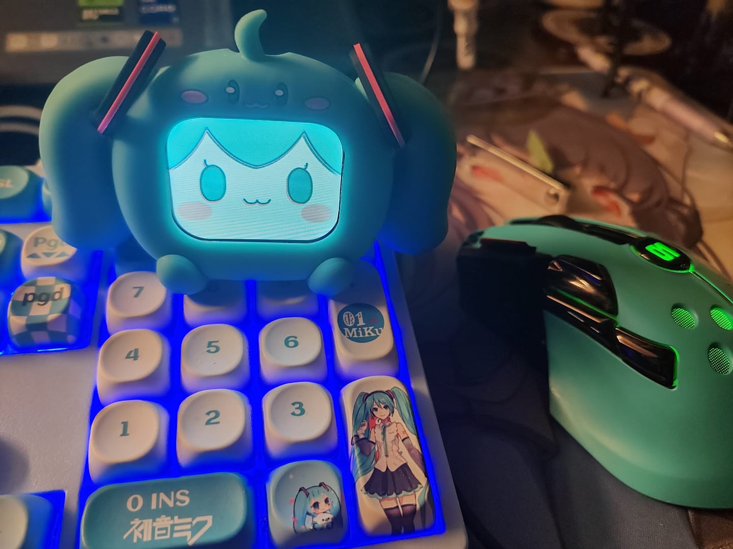 Customer photo review of Officially Licensed Hatsune Miku Wireless Earphones with Smart Display Desktop Stand