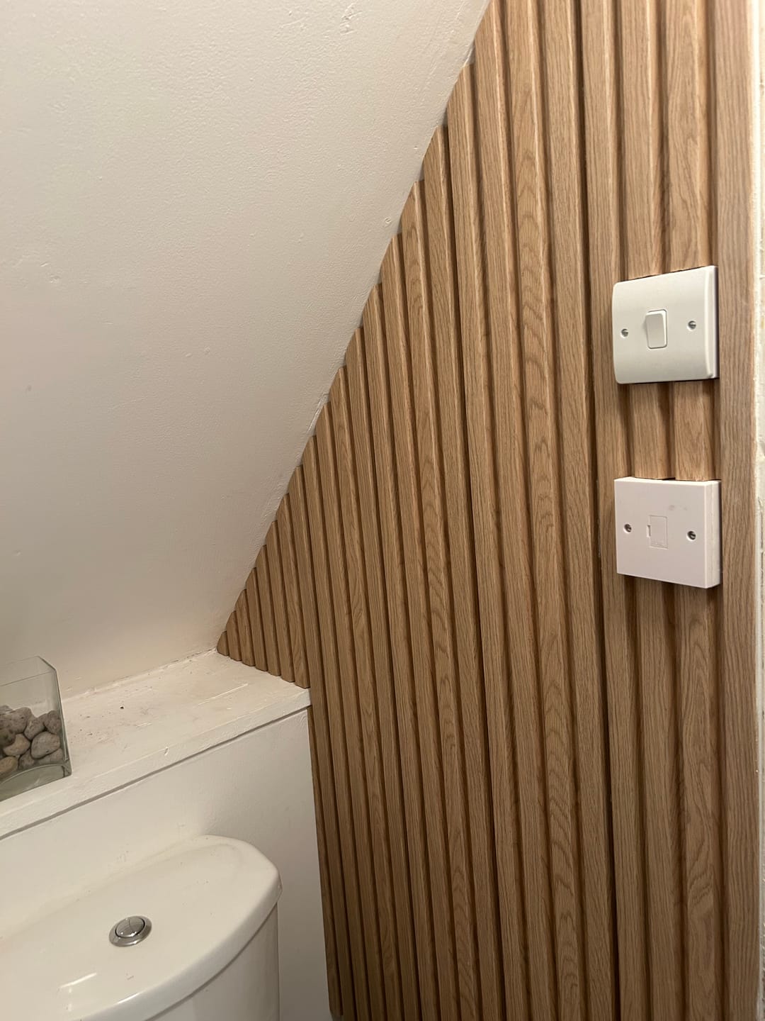 Customer photo review of SlatWall Waterproof Natural Oak Panel