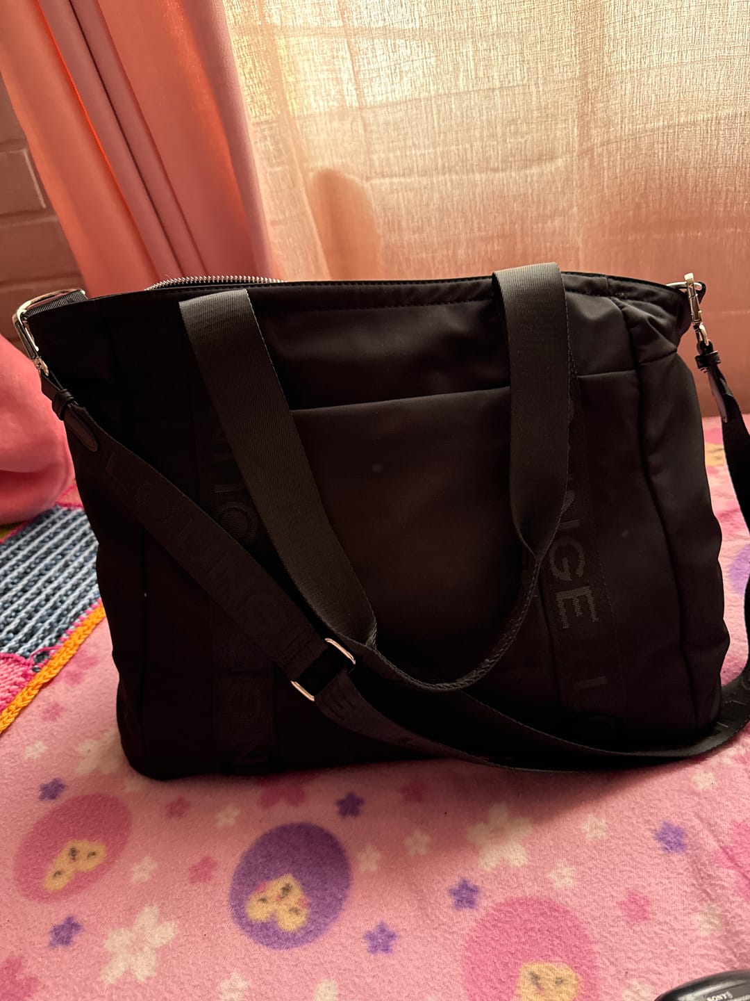 Customer photo review of Bolso Nylon Llavero Street