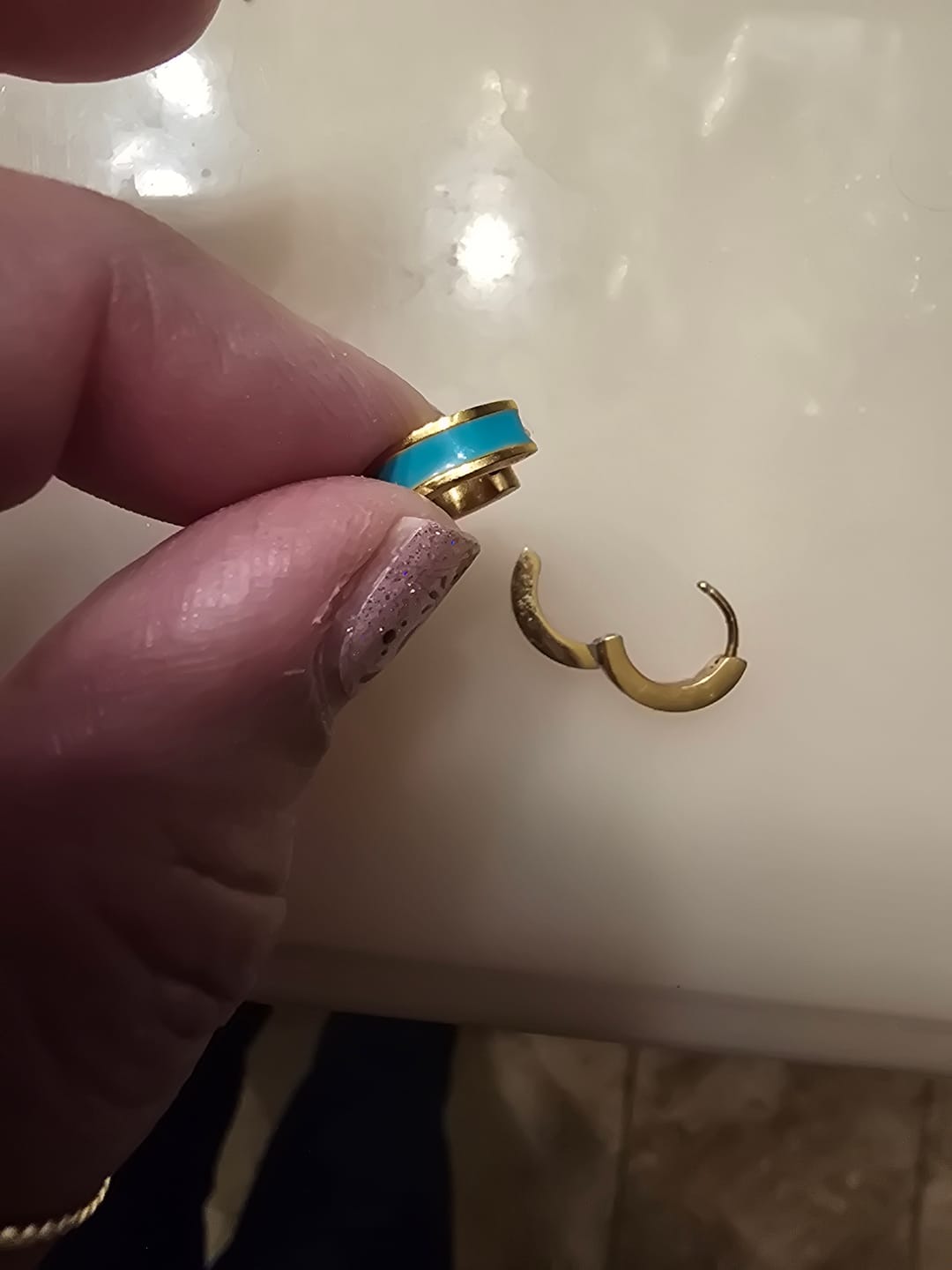 Customer photo review of Leigh Teal Hoop Earrings