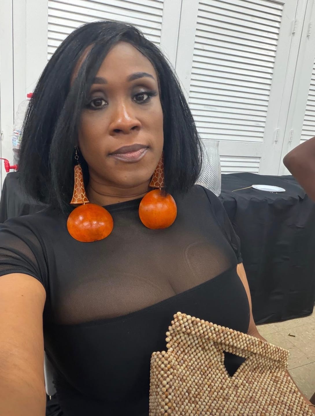 Customer photo review of Giraffe Neck Statement Earrings