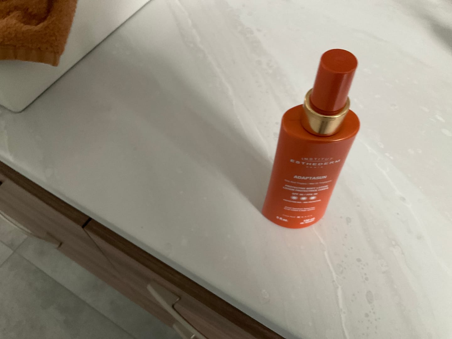 Customer photo review of Lotion protectrice corps FPS 30 - Adaptasun