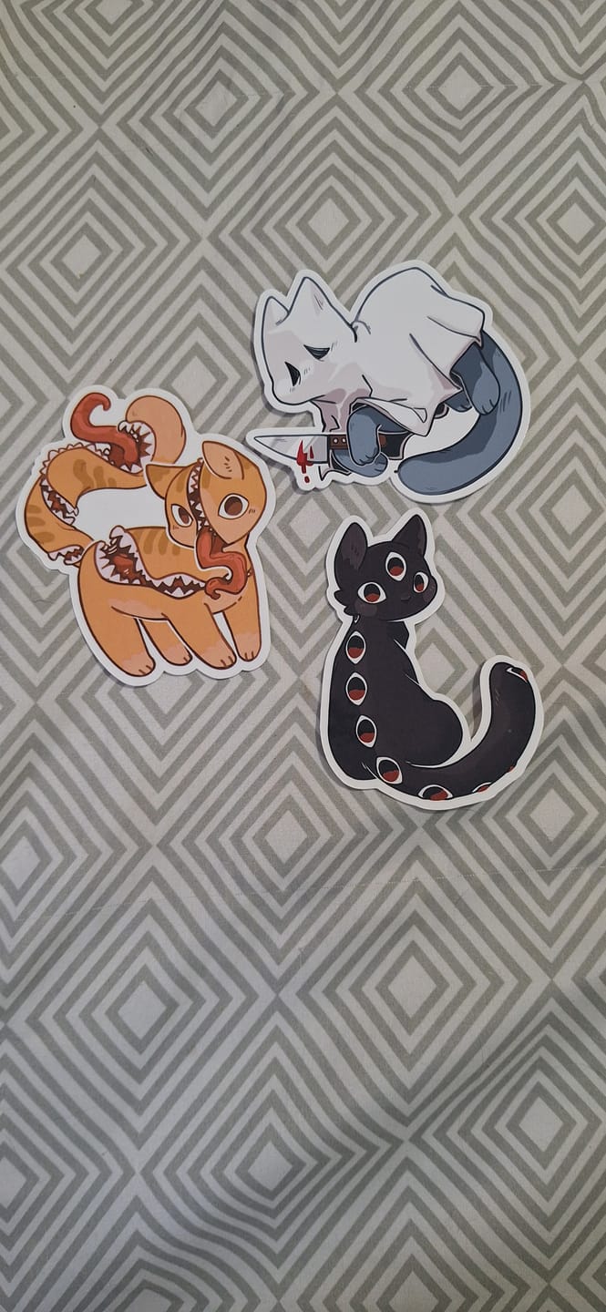 Customer photo review of Creepy Cat Stickers!