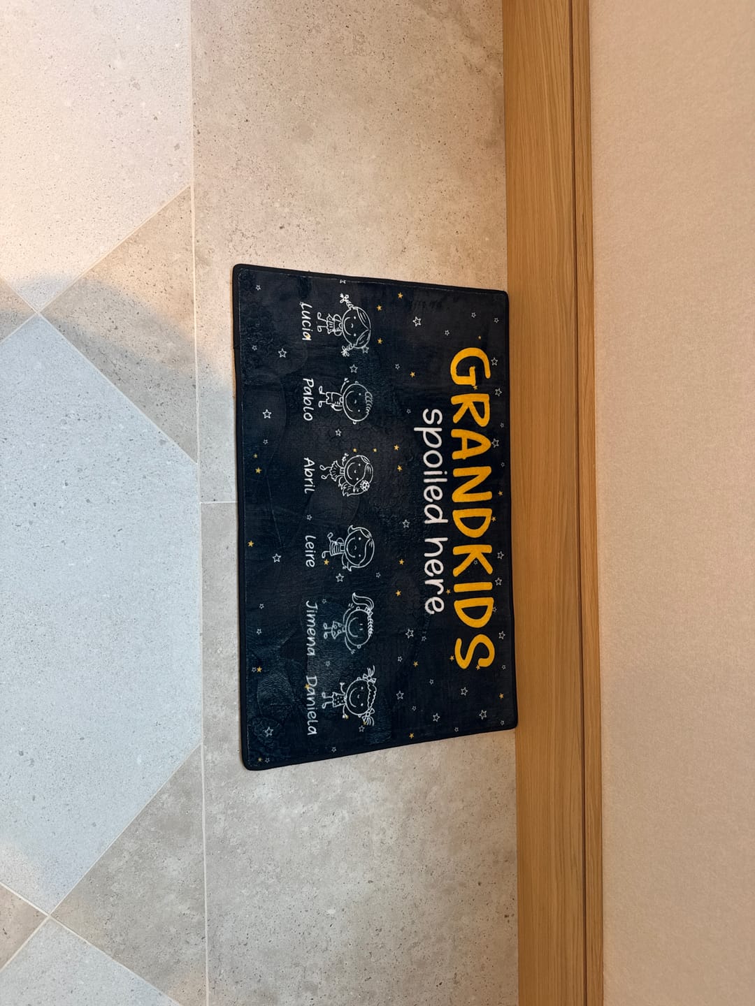 Customer photo review of Grandkids Spoiled Here Doodle - Personalized Doormat