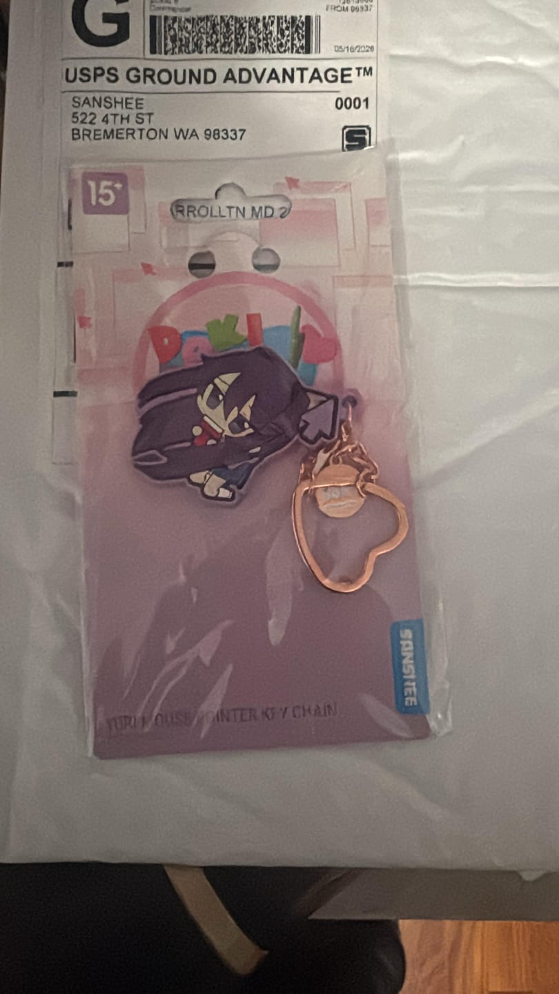 Customer photo review of Doki Doki Literature Club - Yuri Mouse Pointer Rubber Keychain