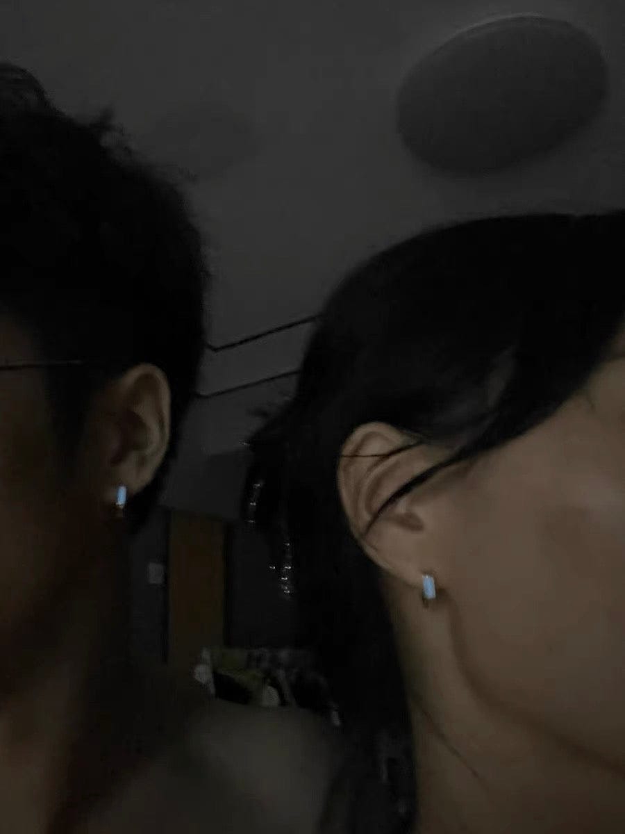 Customer photo review of Luminous Tritium Mobius Earrings