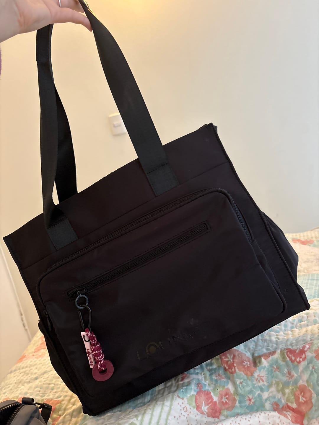 Customer photo review of Bolso Nylon Llavero Computador Icónica