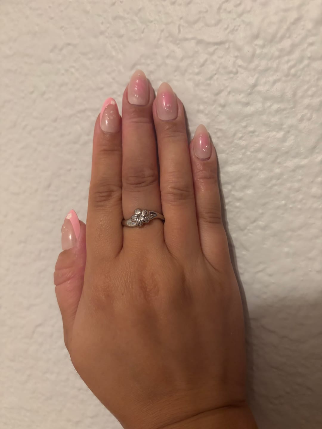 Customer photo review of Cowrie Plumeria Ring