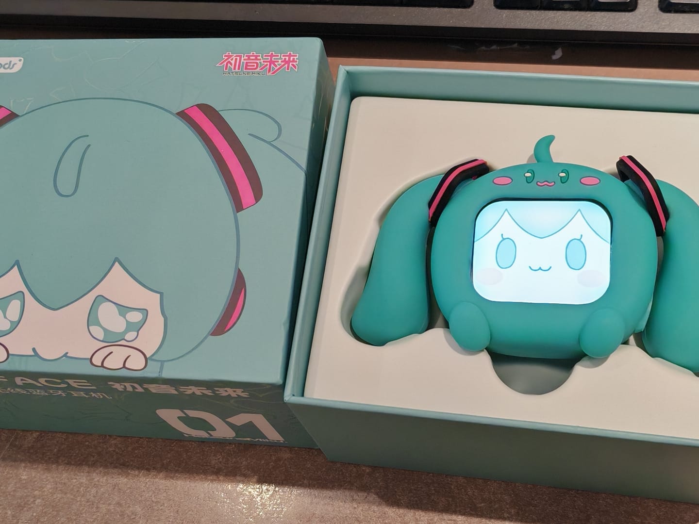 Customer photo review of Officially Licensed Hatsune Miku Wireless Earphones with Smart Display Desktop Stand