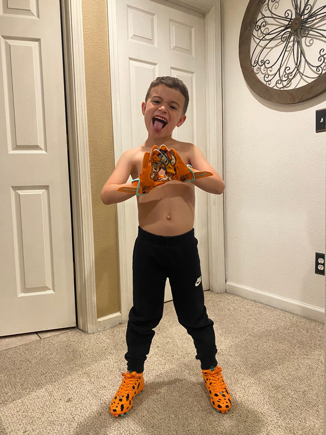 Customer photo review of The Flintstones "Bedrock Blitz" Football Gloves - VPS5 by Phenom Elite