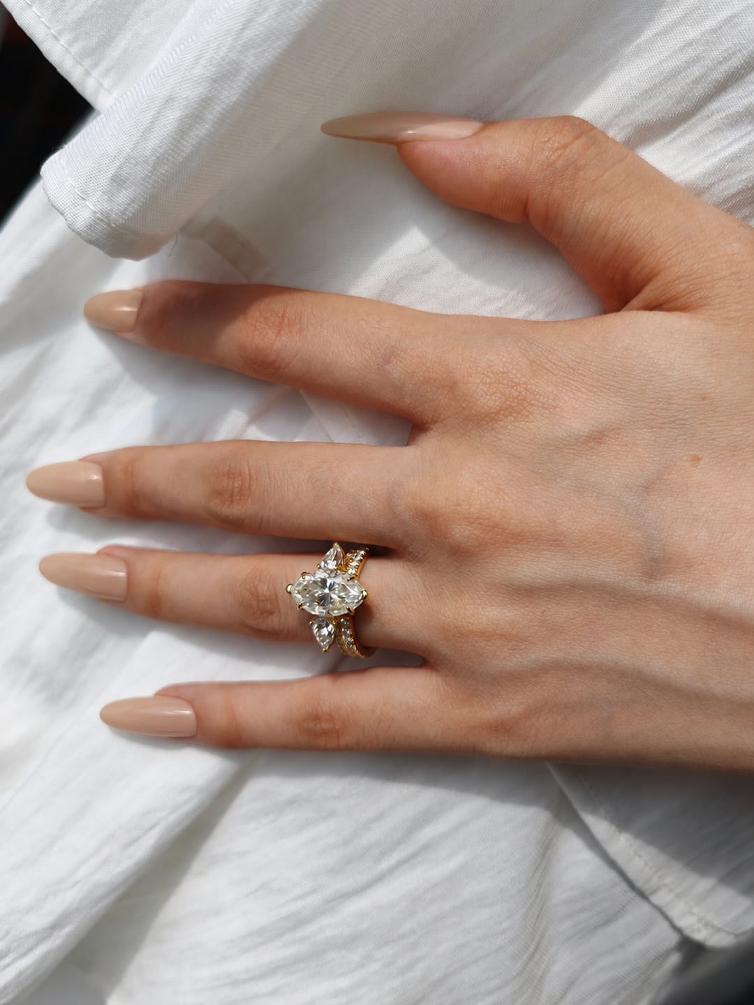 Customer photo review of S925 Moissanite 3.0Ct~4.0Ct Marquise/Oval Cut Yellow Gold Wedding Ring with Pear Cut Wedding Band