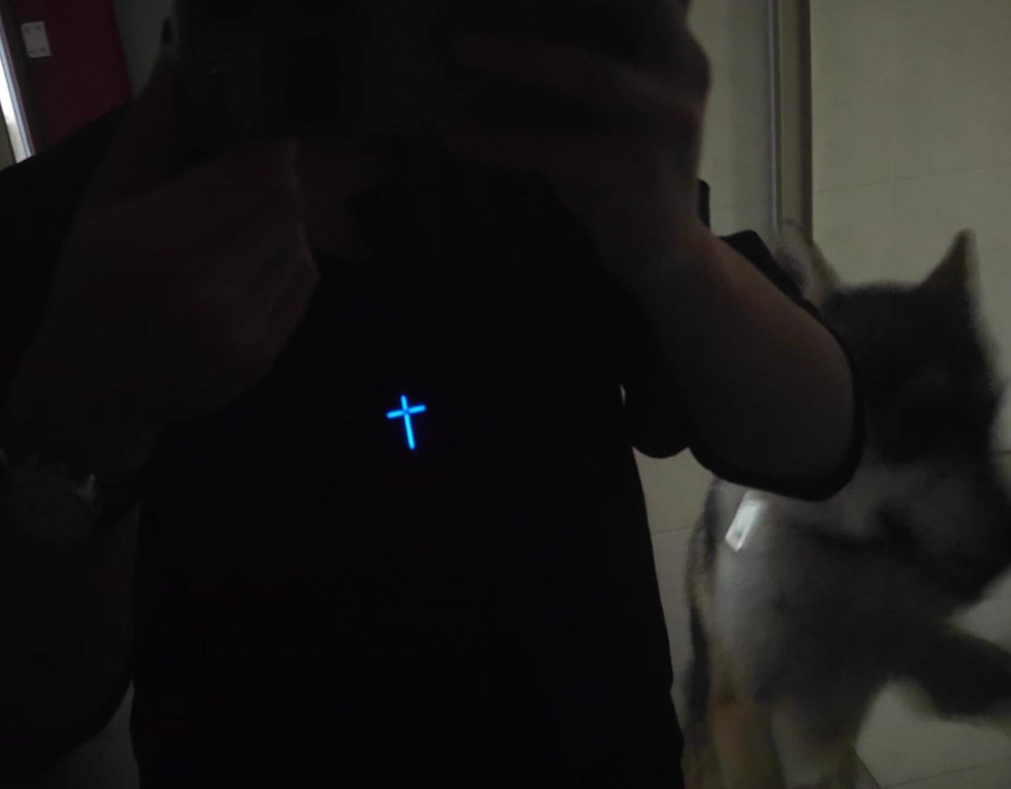 Customer photo review of Cyber Tritium Cross Pendant
