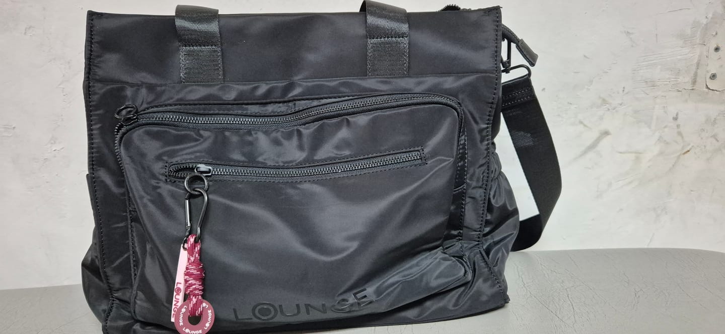 Customer photo review of Bolso Nylon Llavero Computador Icónica