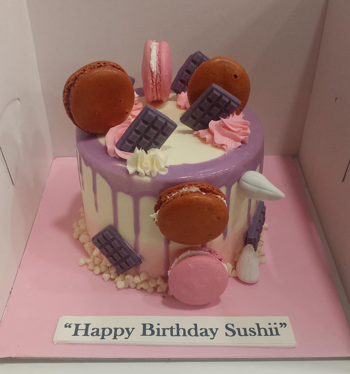 Customer photo review of Purple Drip Macaron Cake