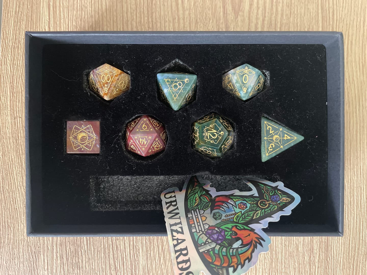 Customer photo review of URWizards D&D Indian Agate Engraved Dice Set Astrology Style