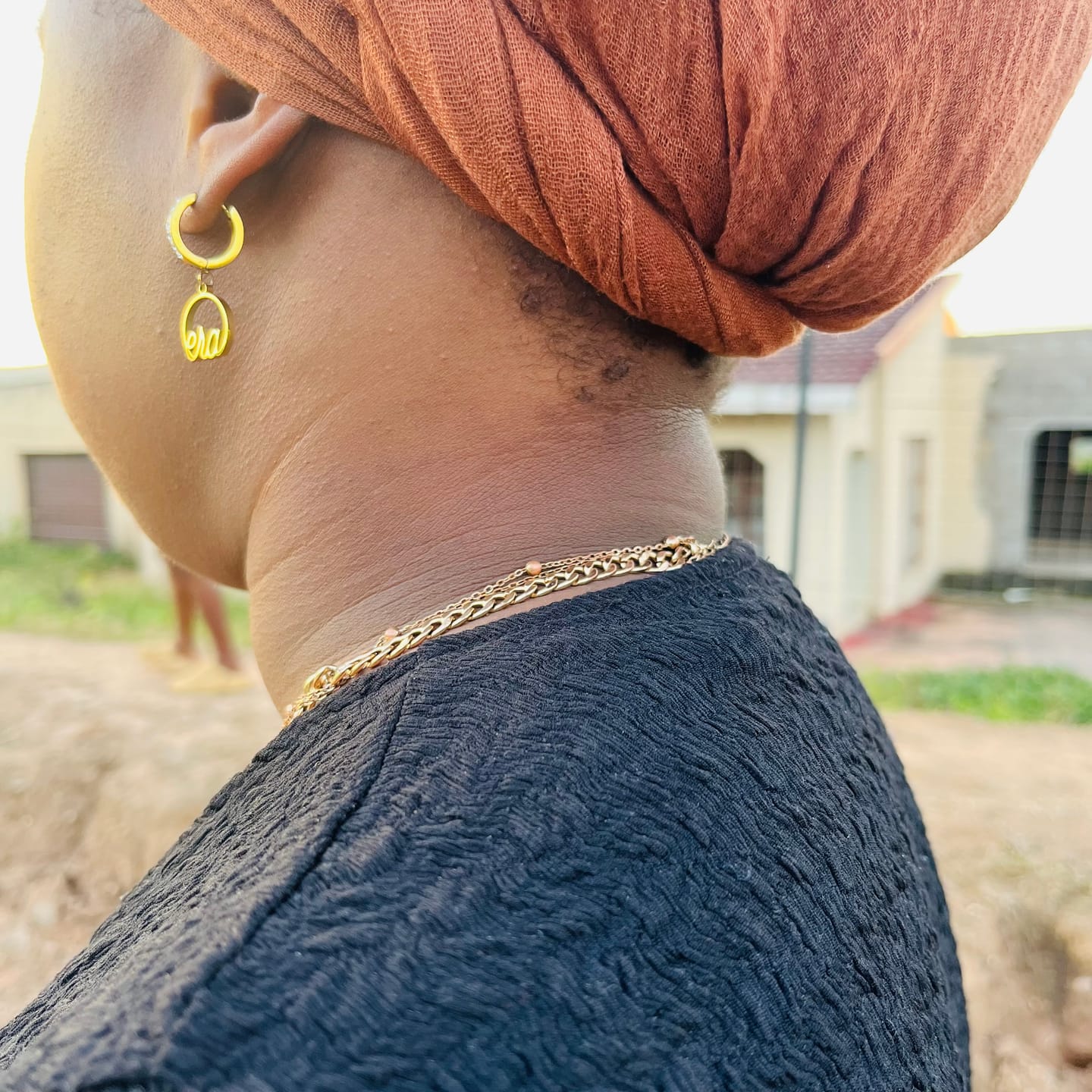 Customer photo review of Gold Precious Logo Earrings