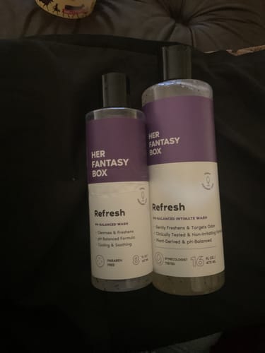 Customer's photo showing a small and a large bottle of Refresh Plant Based Intimate Body Wash side-by-side.