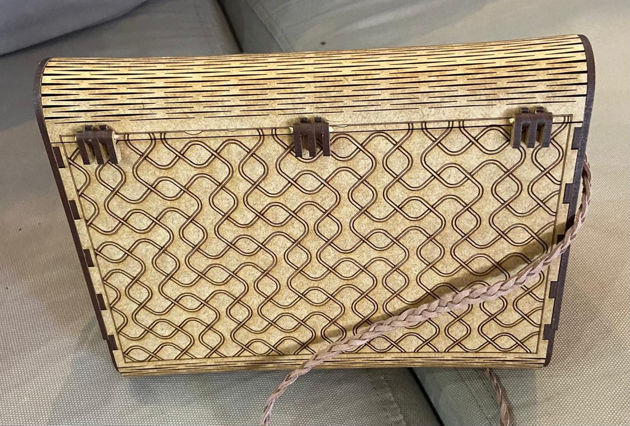 Customer photo review of 4 Design Clutch Bag Laser Cut SVG File