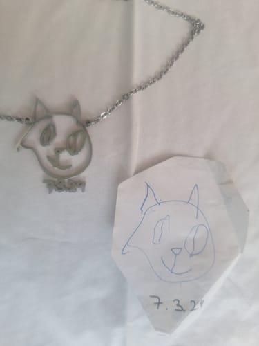 Customer photo review of Personalized Child Drawing Necklace or Keychain