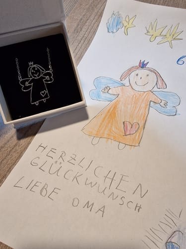 Customer photo review of Personalized Child Drawing Necklace or Keychain
