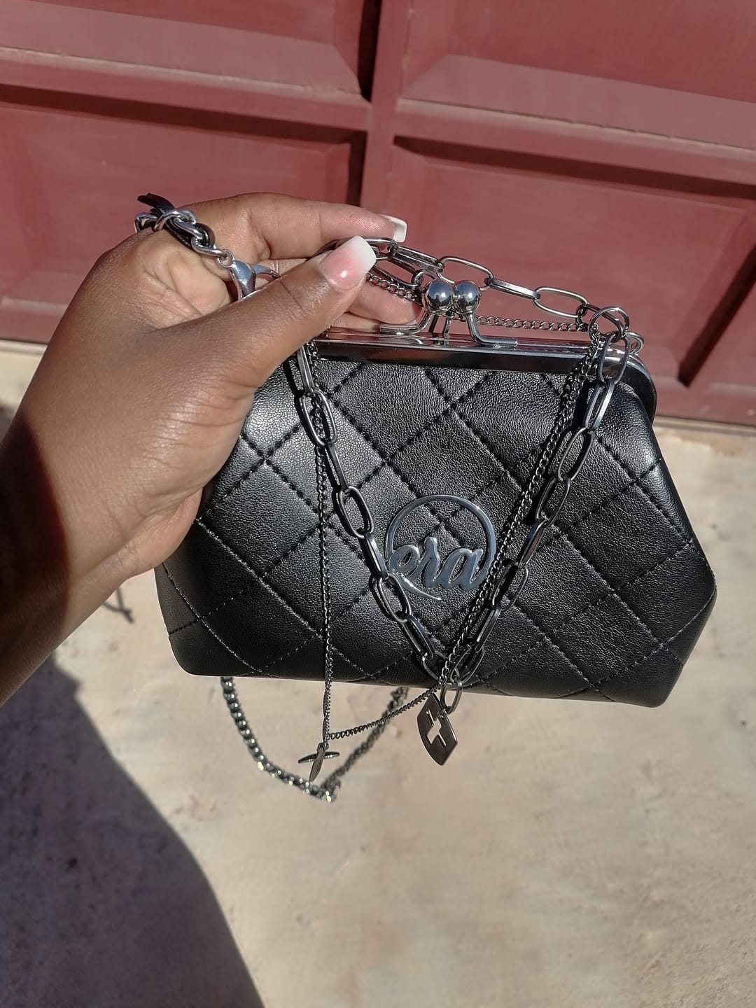 Customer photo review of ERA Mini Kisslock Chain Bag – Black