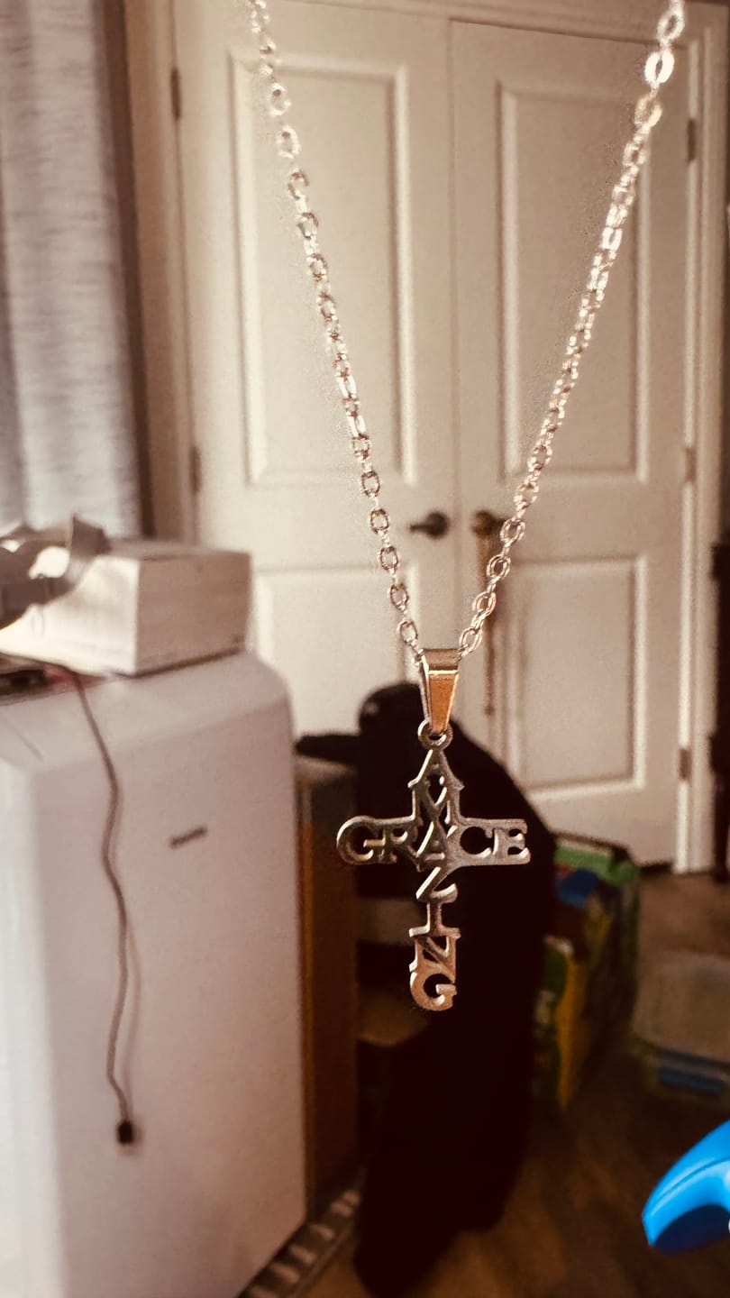 Customer photo review of AMAZING GRACE Cross Necklace: A Testament of Divine Love