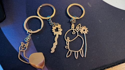 Customer photo review of Personalized Child Drawing Necklace or Keychain