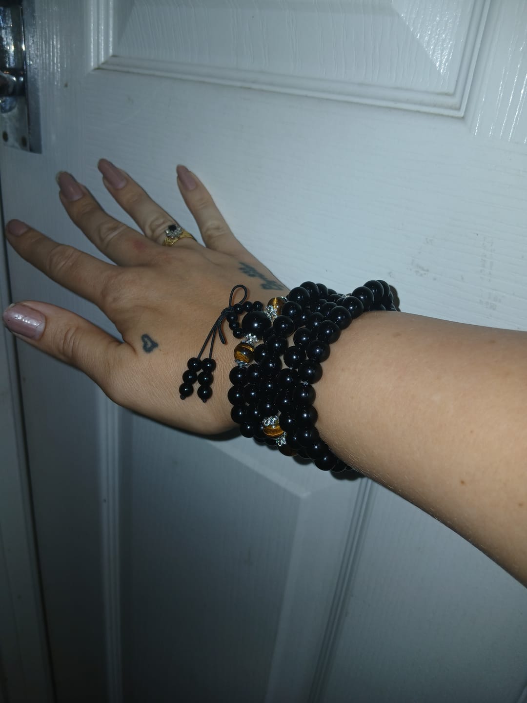 Customer photo review of Buddha Stones 108 Beads Natural Black Obsidian Tiger Eye Mala Bracelet