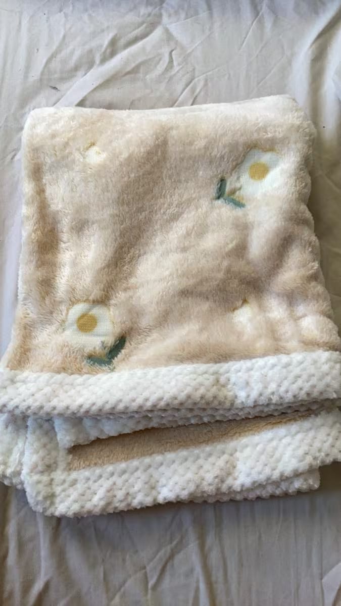 Customer photo review of Blossom Plush Baby Blanket