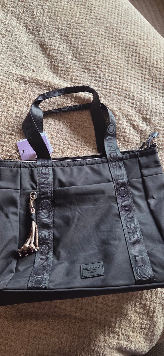 Customer photo review of Bolso Nylon Llavero Street