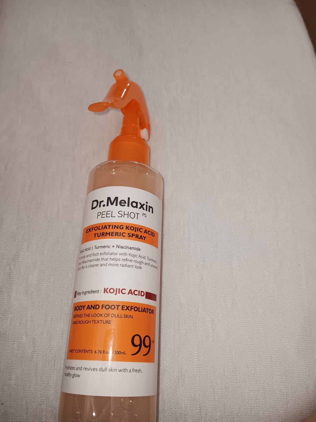 Customer photo review of Spray Exfoliant Anti-Taches Corps · Kojic Acid 99%