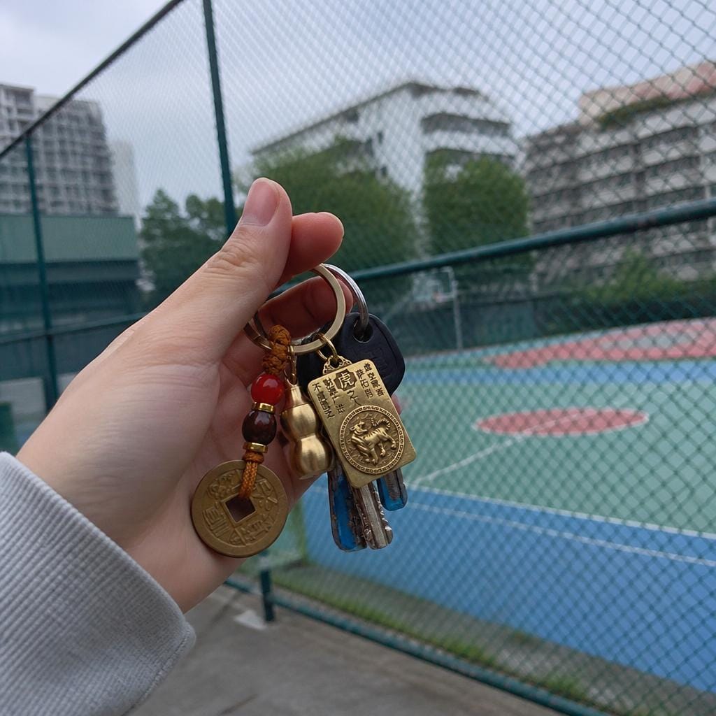 Customer photo review of FuAttract Fortune Blessings Chinese Zodiac Guardian Calabash Cinnabar Brass Keychain