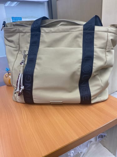 Reseña con foto de un cliente sobre Bolso Nylon Llavero Street