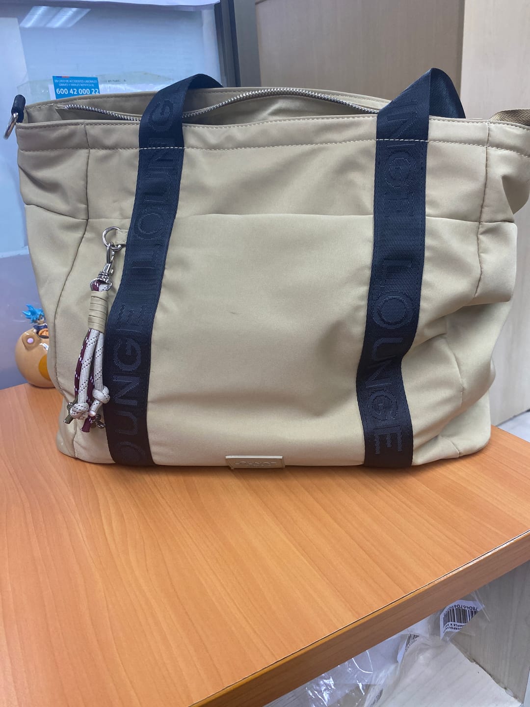 Customer photo review of Bolso Nylon Llavero Street