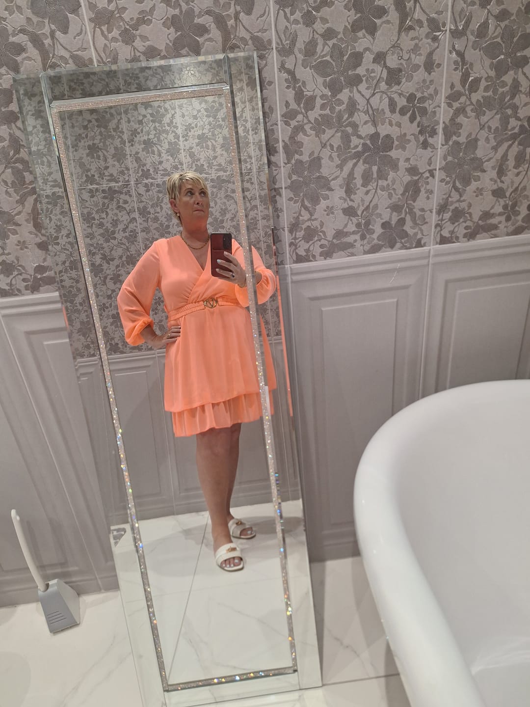 Customer photo review of Marlowe Coral Wrap Mini Dress