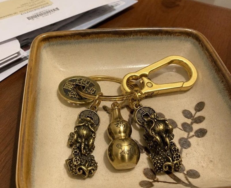 Customer photo review of FuAttract Fortune Protection Prosperity Flow Brass Chinese Zodiac Keychain with Pixiu