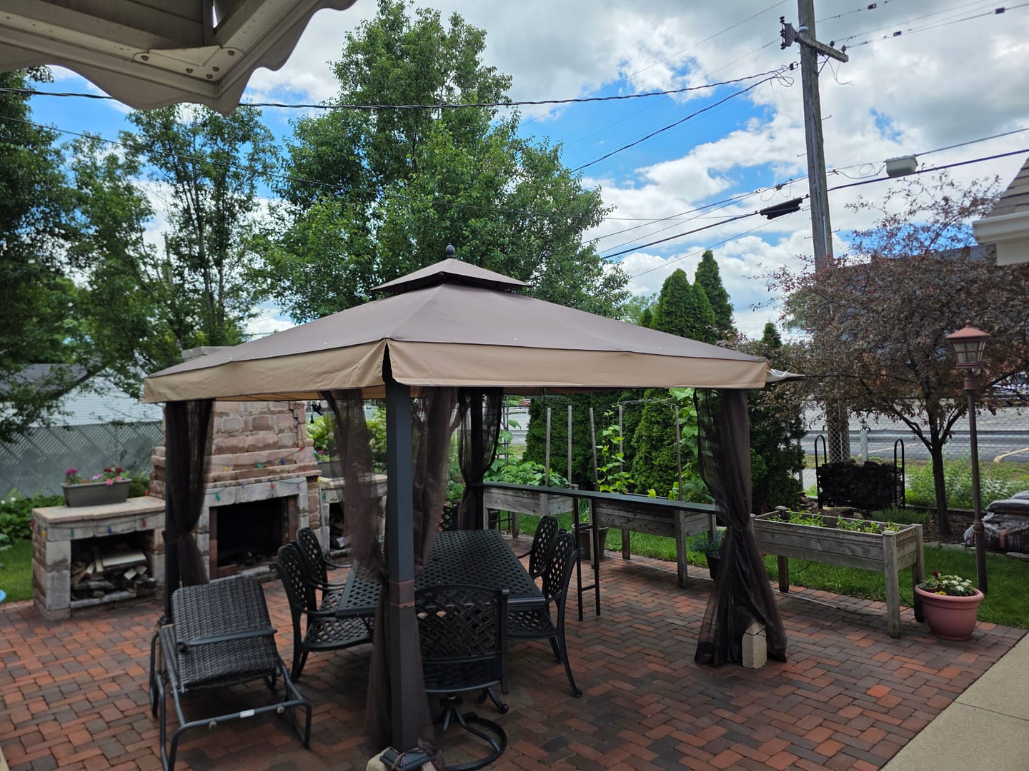 Customer photo review of Shade N' Shelters 10' x 10' Conley Gazebo w/ Awning & Bar - Main & Roof Vent Canopies
