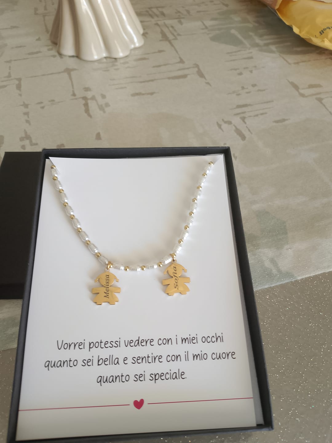 Customer photo review of Girocollo Family In Perle con ciondoli Bimbo Personalizzati