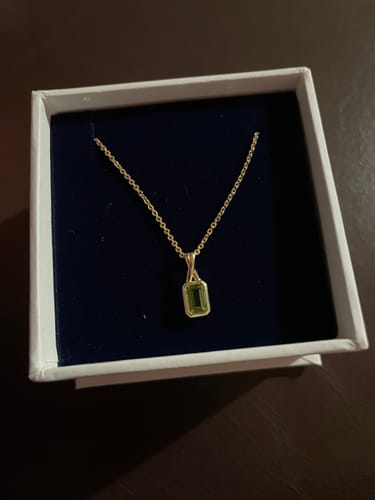 Customer photo review of Emerald Cut Peridot Twist Bezel Set Pendant in 9ct Yellow Gold