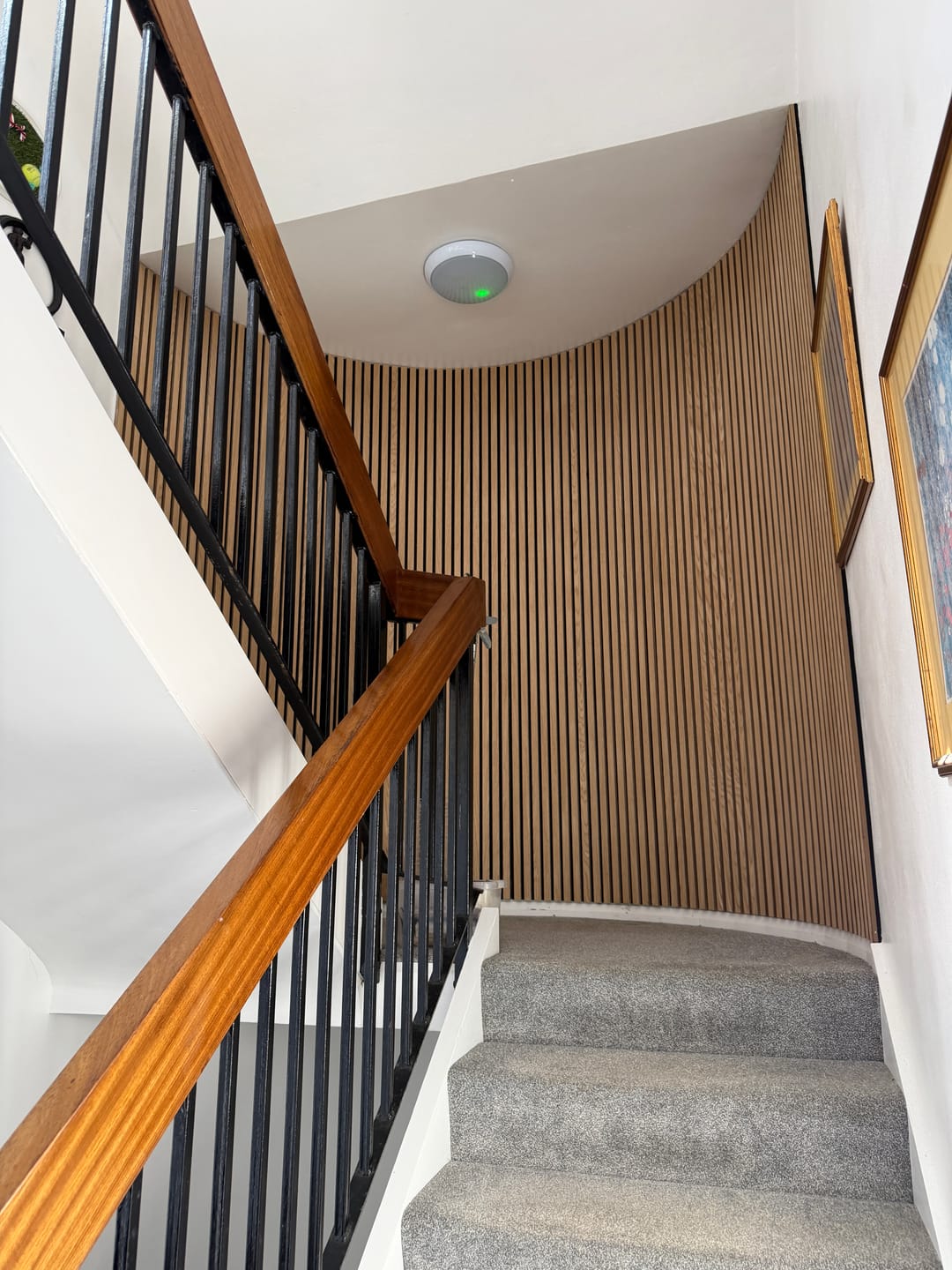 Customer photo review of SlatWall Waterproof Natural Oak and Black Panel