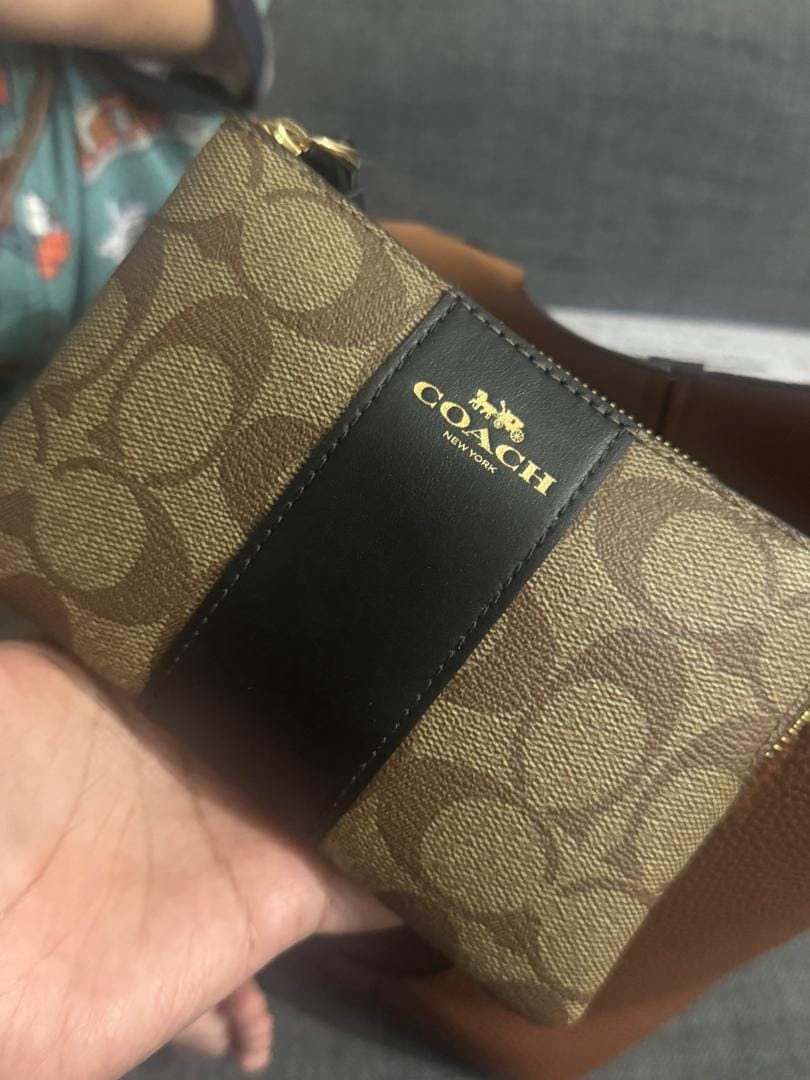 Customer photo review of Coach Corner Zip Wristlet With Stripe In Khaki Black CS602