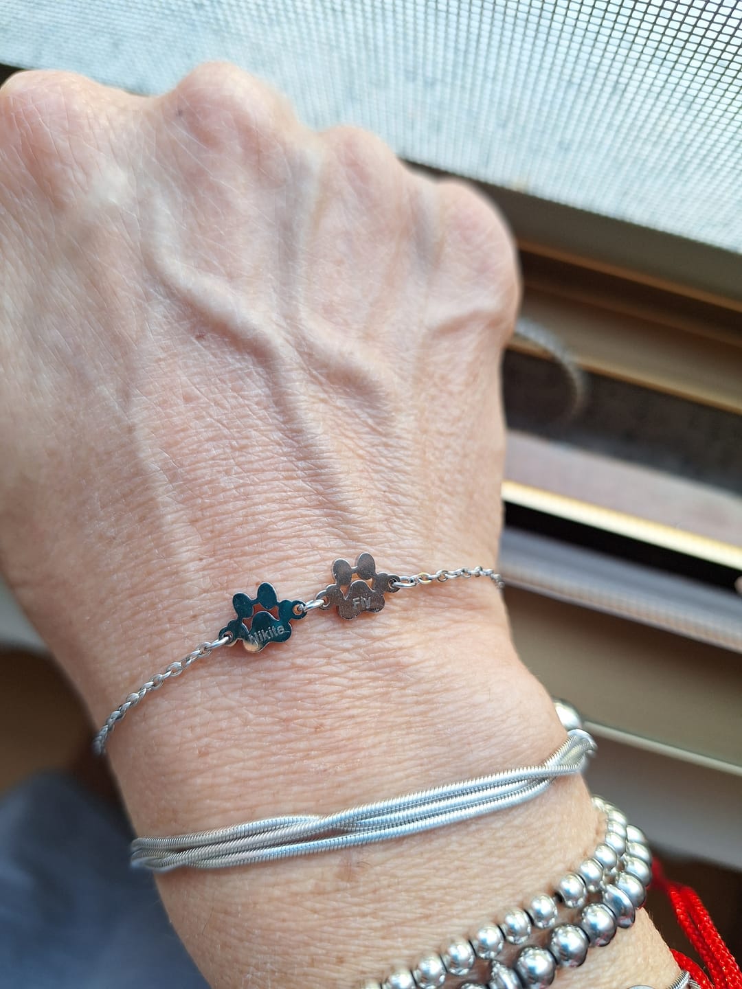 Customer photo review of 2 zampette personalizzate (+3€)