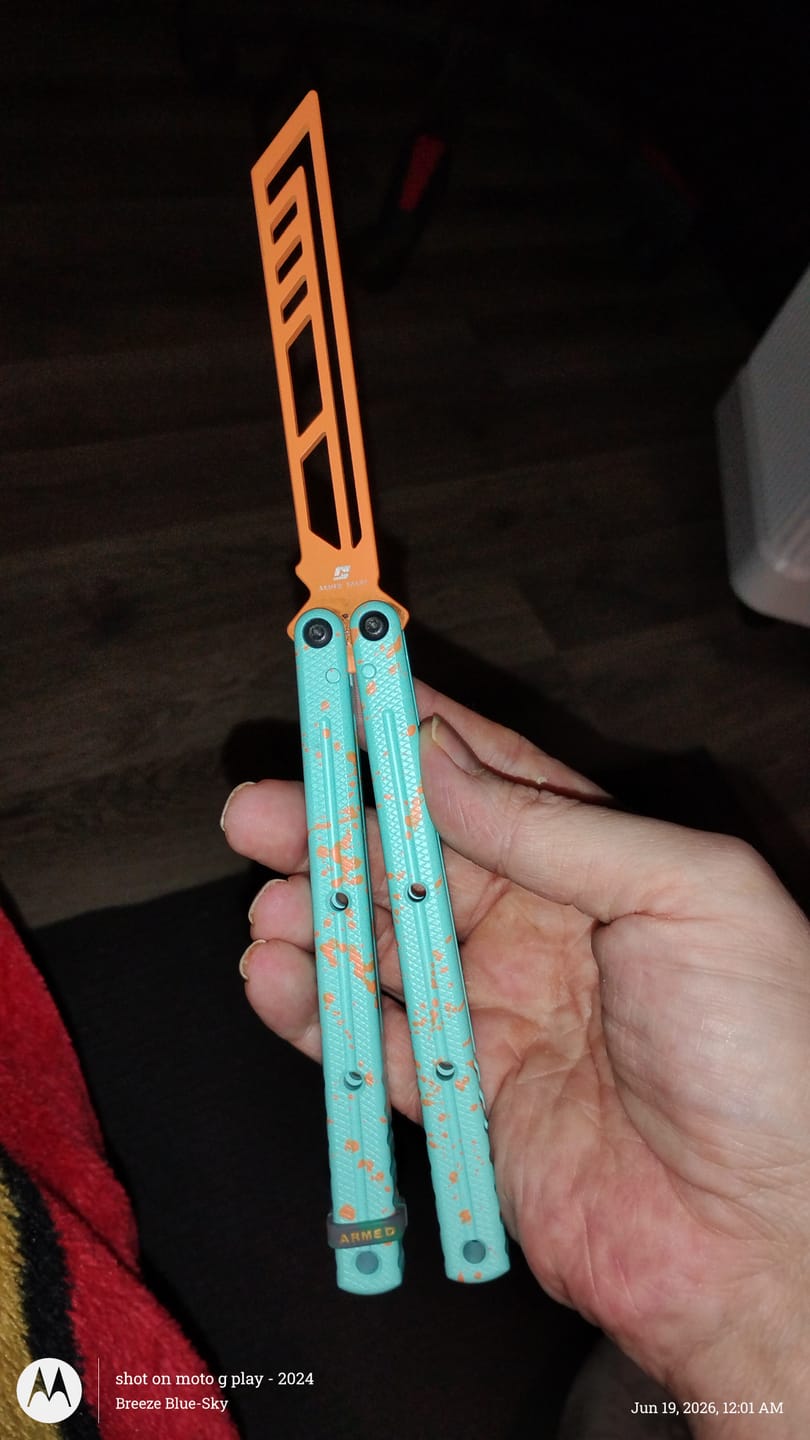 Customer photo review of ARMED SHARK kraken v3 clone Seven series aluminum alloy handle stainless steel Trainer blade Bushings
