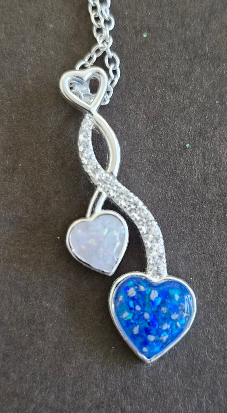 Customer photo review of Two Hearts Entwined Cubic Zirconia Keepsake Pendant