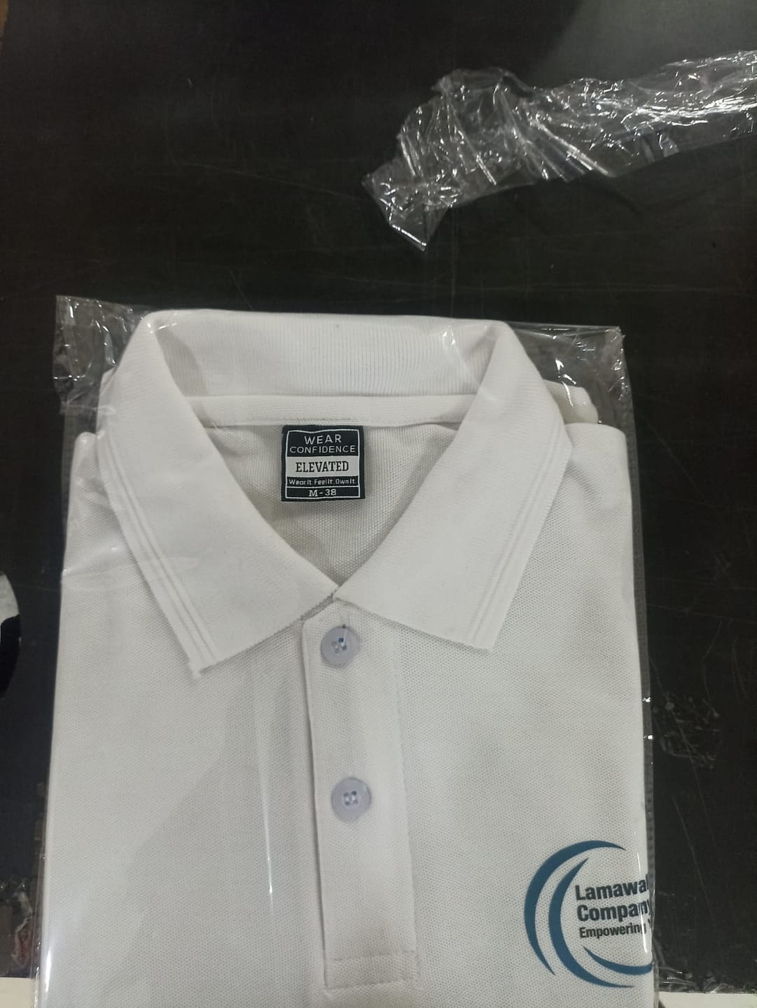 Customer photo review of Customized Polo T-Shirt With Your Company Logo | Order Logo Printed Tees | PrintMine.in