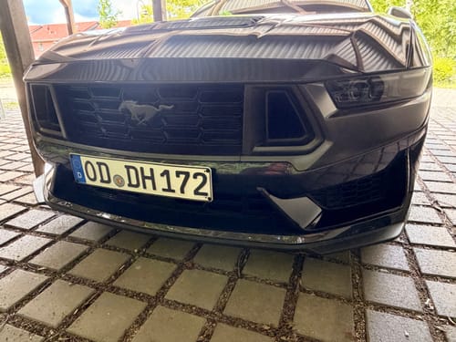 Customer's black Ford S650 Mustang Dark Horse with the OEM Plinth Delete Kit installed for a clean front-end look.