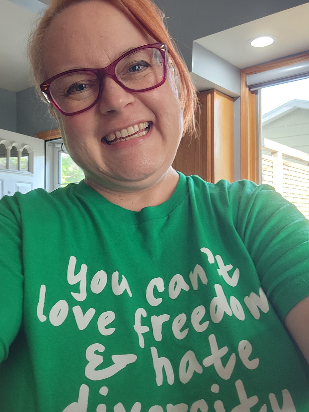Customer photo review of You Can’t Love Freedom and Hate Diversity Unisex Tee