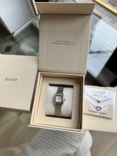 Customer's Macy Petite Gold Silver watch in its elegant beige presentation box after unboxing.