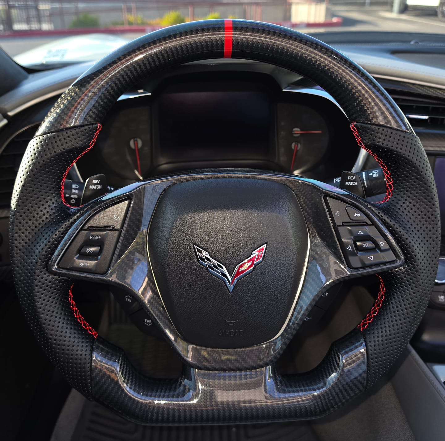 Customer photo review of Real Carbon Fiber Steering Wheel for Chevrolet Camaro 2016-2024 6th Generation D-shaped Flat-Bottom Perforated Leather Grip