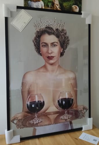 Customer's newly received Majestic art print, framed and showing Queen Elizabeth holding a tray with two glasses of red wine.